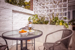 Olive Tree - fabulous central location with patio garden & parking space